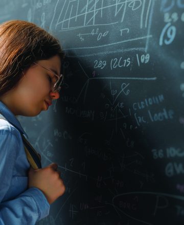 Back,To,School.,Unhappy,Teenager,Indoors.,Girl,Is,Learning,In