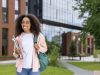 Smiling,African,American,Student,With,Glasses,And,Backpack,Standing,On