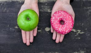 Choosing,Between,Apple,And,Donut