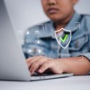 Cyber,Security,Concept,Showing,Asian,Boy,Using,Laptop,With,Digital