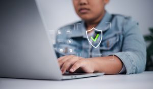 Cyber,Security,Concept,Showing,Asian,Boy,Using,Laptop,With,Digital