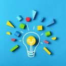 Idea,Creativity,Education,Concept,With,Lightbulb,Colorful,Geometric,Shapes,On