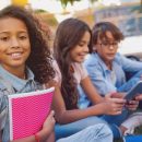 Portrait,Of,Preteen,African,School,Girl,And,Children,On,Background