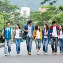 Asian,College,Students,Walking,Together,On,Campus