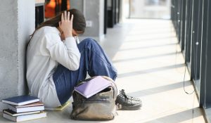 Lonely,Sad,Schoolgirl,While,All,Her,Classmates,Ignored,Her.,Social