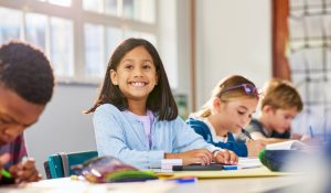 Portrait,Of,Excited,Cute,Little,Indian,Girl,Sitting,In,A