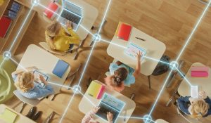 Top,Down,View:,Children,In,A,School,Use,Tablets,And