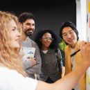 Group,Of,Multi,Ethnic,Colleagues,Collaborating,And,Sharing,Ideas,During