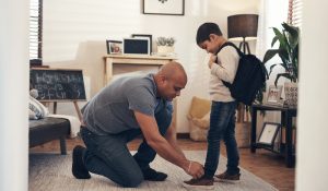 Father,,Boy,And,Tie,Lace,In,Home,With,Morning,Routine,