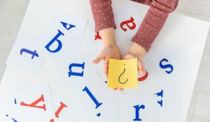The,Child,Learns,English,Letters.,Selective,Focus.,Kid.
