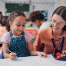 Education,,Girl,And,Teacher,In,Classroom,,Help,And,Support,With