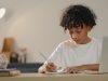 Little,Boy,Doing,Her,Homework,At,Home.,Study,At,Home