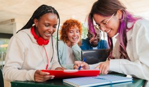 Excited,Diverse,Students,Engaged,In,Collaborative,Learning,While,Studying,Together
